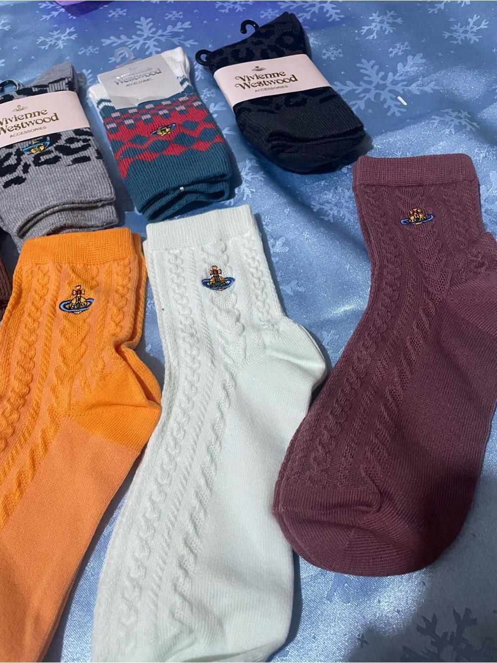7 pairs Vivienne Westwood Cable Knit Socks in Orange, Cream & Maroon